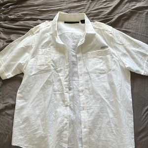 Old school Sean John short sleeve button up. Still in good condition. Size XL